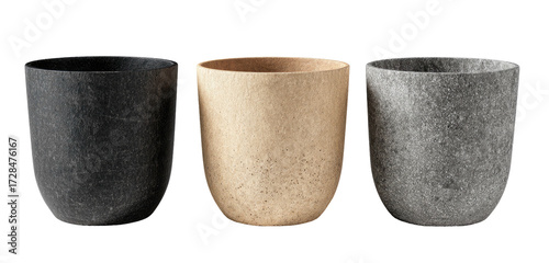 Three simple, textured plant pots in muted tones