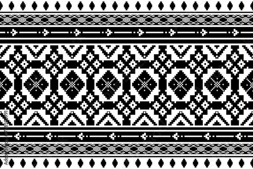 Vertical seamless tribal pixel pattern in black and white with fine geometric details, suitable for fabrics, cards, and decorative applications.