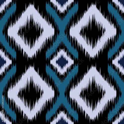 Foto Ethnic ikat seamless pattern in tribal.