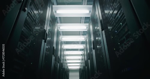 Server Room with Illuminated Aisle and Equipment