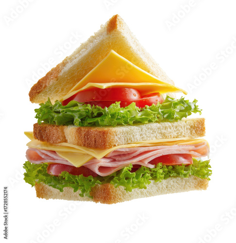 Stacked sandwich with cheese, ham, and lettuce