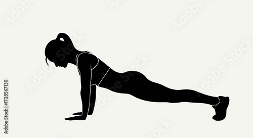 Silhouette of a Woman Doing a Push-up Exercise for Strength and Fitness