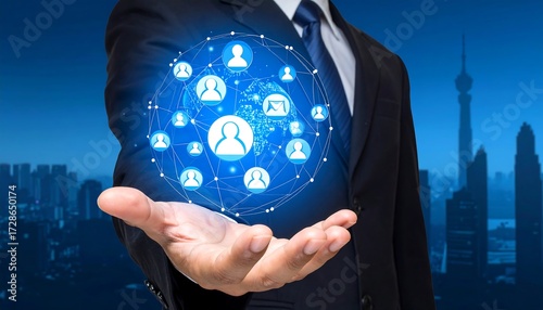 Businessman holding a digital network sphere