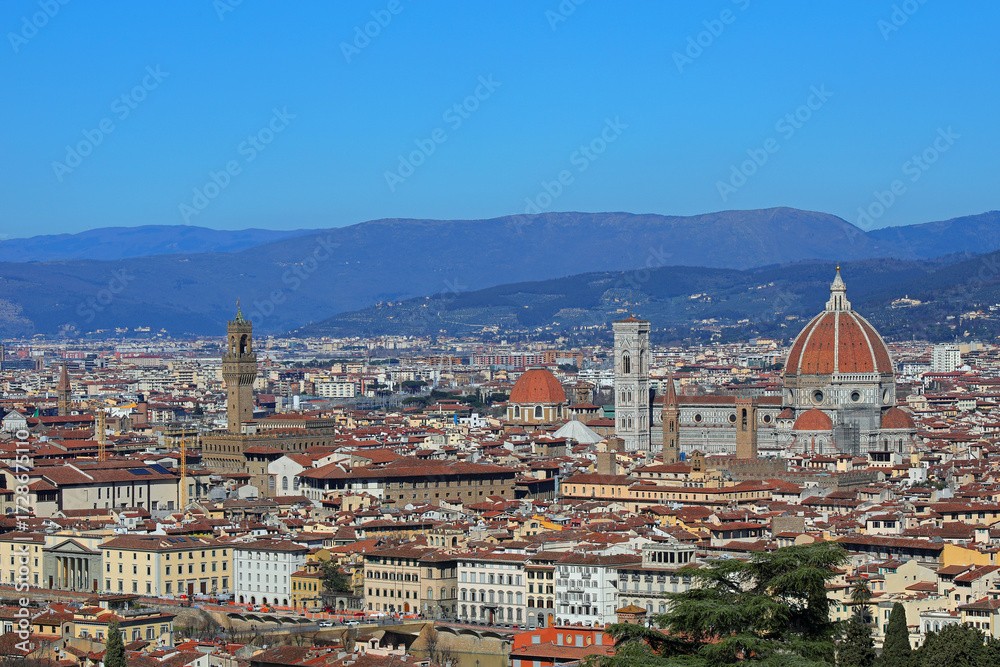 Obraz premium Florence in Italy with OLD PALACE and the Cathedral with Dome of Brunelleschi Architect and Italian Apennines Mountains in background