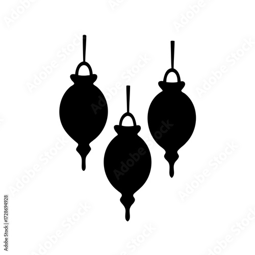 Three antique style black hanging ornaments against a stark white background