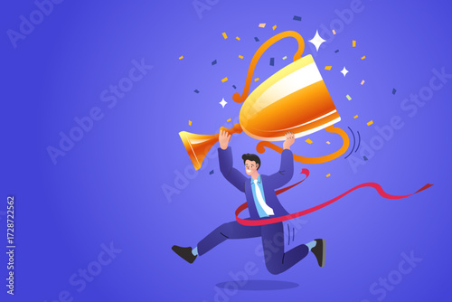 A successful businessman celebrates a victory, jumping with joy and holding a gold trophy. Concept of career achievement, winning a competition, and reaching a goal.