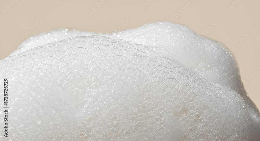 Obraz premium Close-up of fluffy white soap foam creating a clean and pristine texture