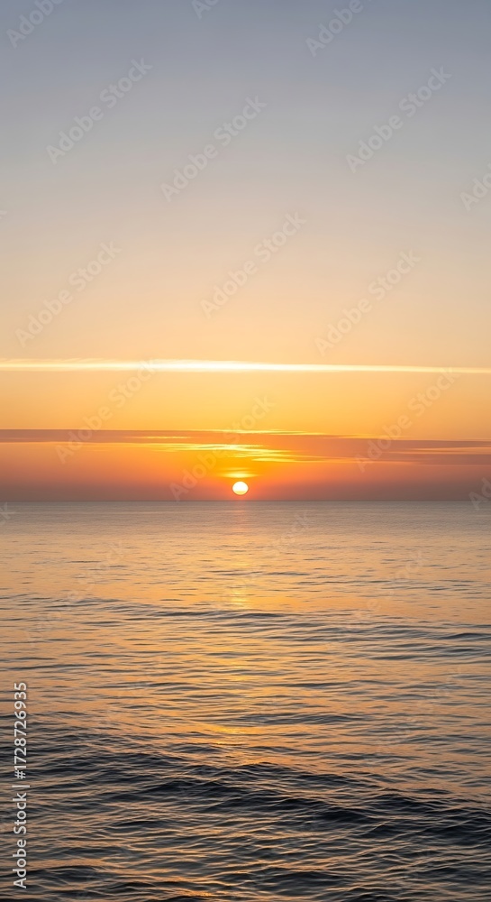 Obraz premium Sunset over calm water