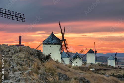 Historic windmills of Consuegra at sunset, Castilla-La Mancha, Spain.