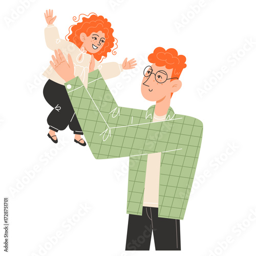 A man holds a child in the air both with orange hair