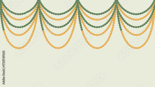 A decorative garland of green and yellow beads hanging against a light beige background space above