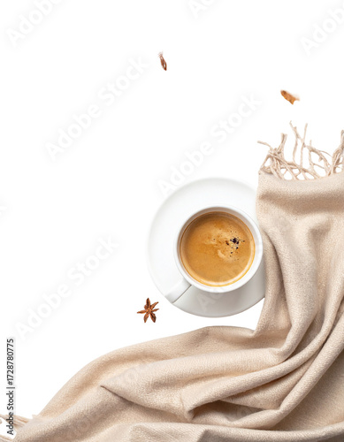 A cozy cup of coffee with a warm blanket
