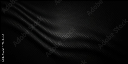 Elegant and luxurious, a dark satin textile with a smooth, soft texture forms a backdrop of gentle curves and waves