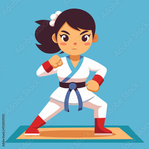 Determined karate girl practicing self defense moves on training mat