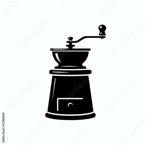 Classic manual coffee grinder with crank handle for freshly ground beans, evoking artisanal brewing and timeless kitchen charm for cafe or home.