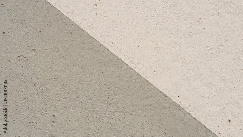 Fototapeta premium Light and dark plaster background diagonal