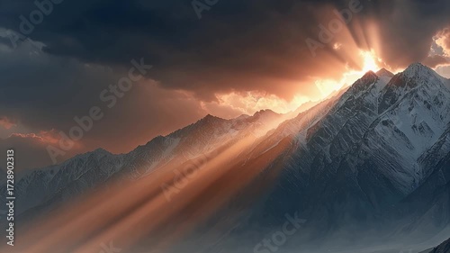 sunset over mountain peaks dramatic sky