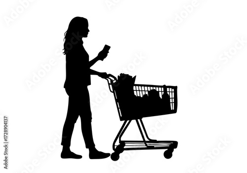 Silhouette of a woman with a shopping cart looking at her phone.