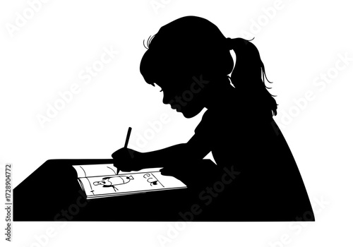 A child concentrates on drawing a picture at her desk.