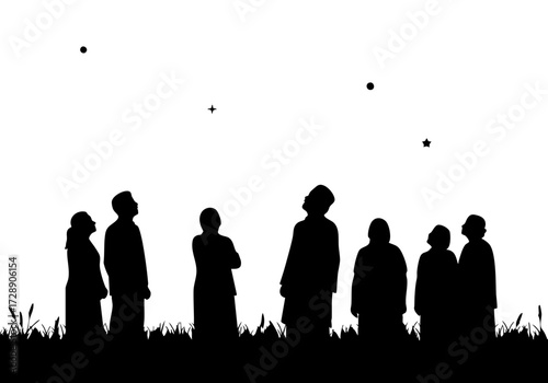A group of people gazing up at the starry night sky.