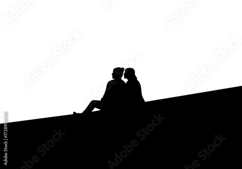 Silhouette of a couple seated, showcasing intimacy and connection.