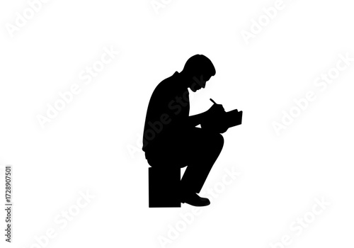 A man sitting in shadow is taking notes.