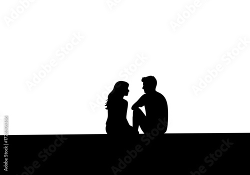 Romantic couple sitting in front of a background, silhouetted against the light, perfect for themes of love, intimacy, and connection.