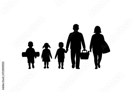 Silhouette of a family walking together, carrying items for a picnic.