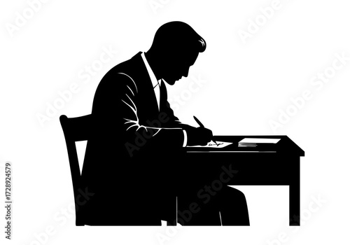 A silhouette of a man concentrating on writing at a desk.