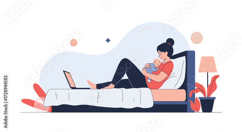 A mother works on her laptop while holding her baby in bed.