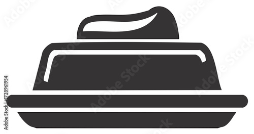 Simple dark gray butter dish with lid and a portion of butter on top