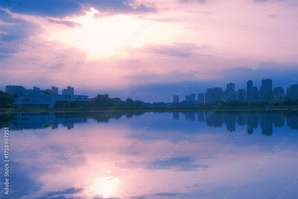 Fototapeta premium Urban architecture, bridges, river landscapes, and beautiful city skyline under the sunset