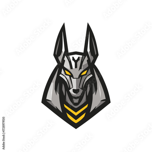 A robotic, stylized jackal head with glowing yellow eyes, geometric shape, and a "Y