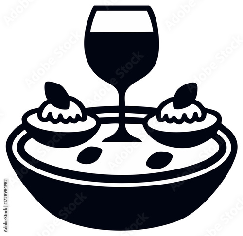 Elegant wine glass and gourmet appetizer icon for dining menu