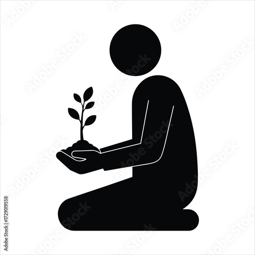Person kneeling holding a small green plant with leaves symbolizing growth hope and new beginnings