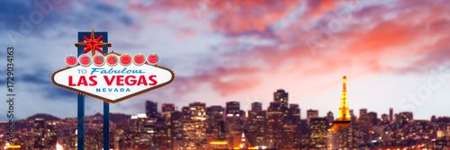 Welcome To Fabulous Las Vegas Sign Panorama With City Skyline Backdrop and Colorful City Lights