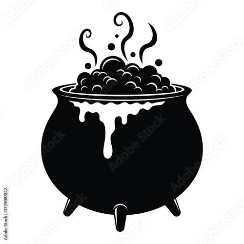 Witch's cauldron bubbling with mysterious potion on halloween night silhouette