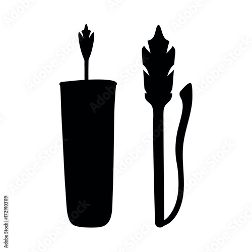 Silhouette of a lit candle and a feather quill pen with inkwell
