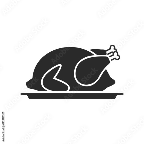 Silhouette of whole roasted turkey on platter