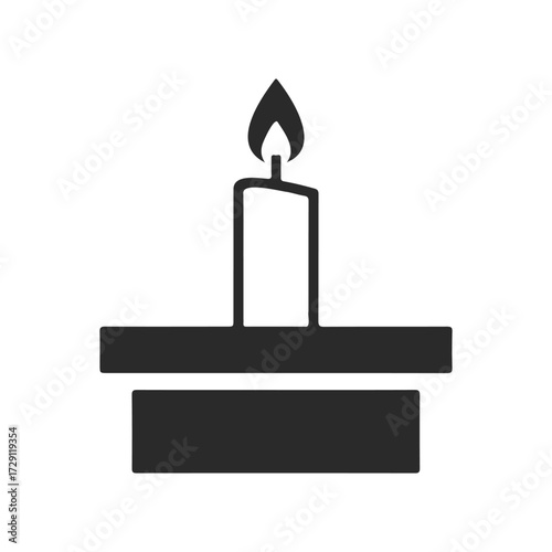 Minimalist candle icon on holder with flame silhouette in black and white