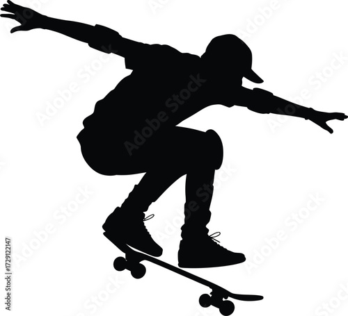 Skateboarder performing trick silhouette action sport