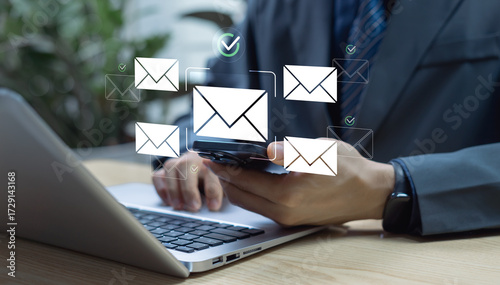Canvastavla Businessman using laptop send email to customers with email icon representing bu