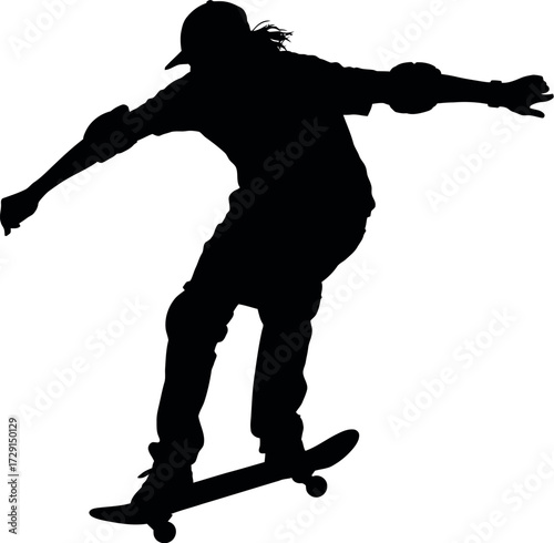 Black silhouette of skateboarder performing trick skateboarding