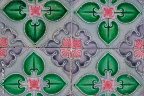 Traditional Peranakan Nyonya ceramic floor tiles in George Town, Penang, Malaysia. The colorful floral and geometric designs are a hallmark of Straits Chinese heritage shophouses.