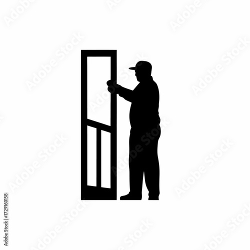 Silhouette of worker closing poultry house gate at night isolated on white background