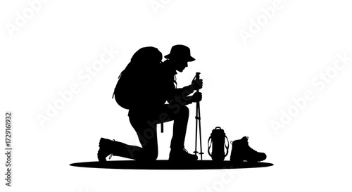 Adventurous hiker pausing to rest during challenging trek with backpack and gear