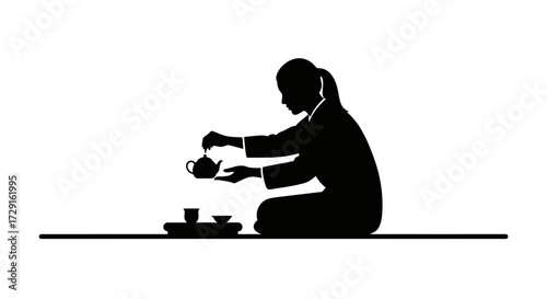 Elegant woman performs traditional tea ceremony, creating serene moments of mindfulness and cultural appreciation.