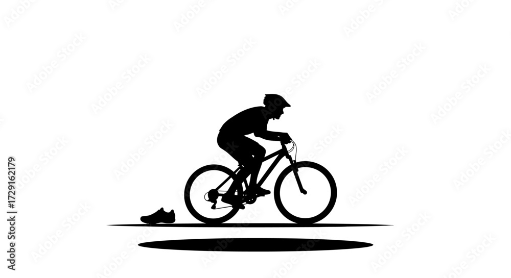 Fototapeta premium Dynamic cyclist in silhouette conquers challenging terrain with intense focus and athletic spirit