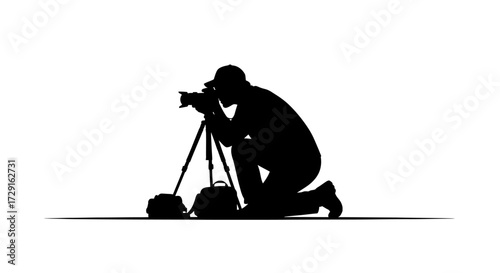 Dedicated photographer capturing stunning moments with professional camera and tripod, focused on creative vision.