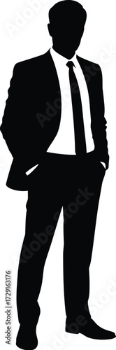 Man in suit standing with hands in pockets shirt trousers